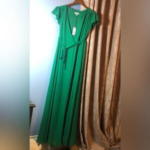 NY & C dress in green beautiful color in XS size.Is a perfect on the body 😍